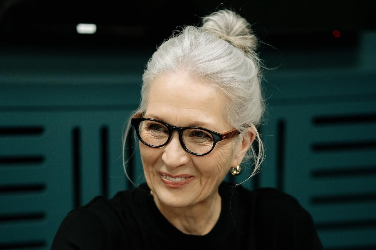 Woman with shiny, silver hair
