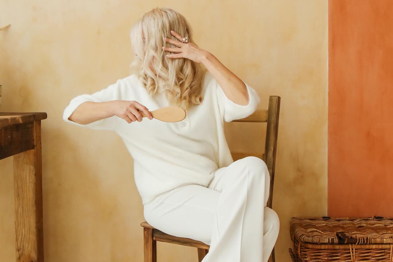 Woman brushing her hair