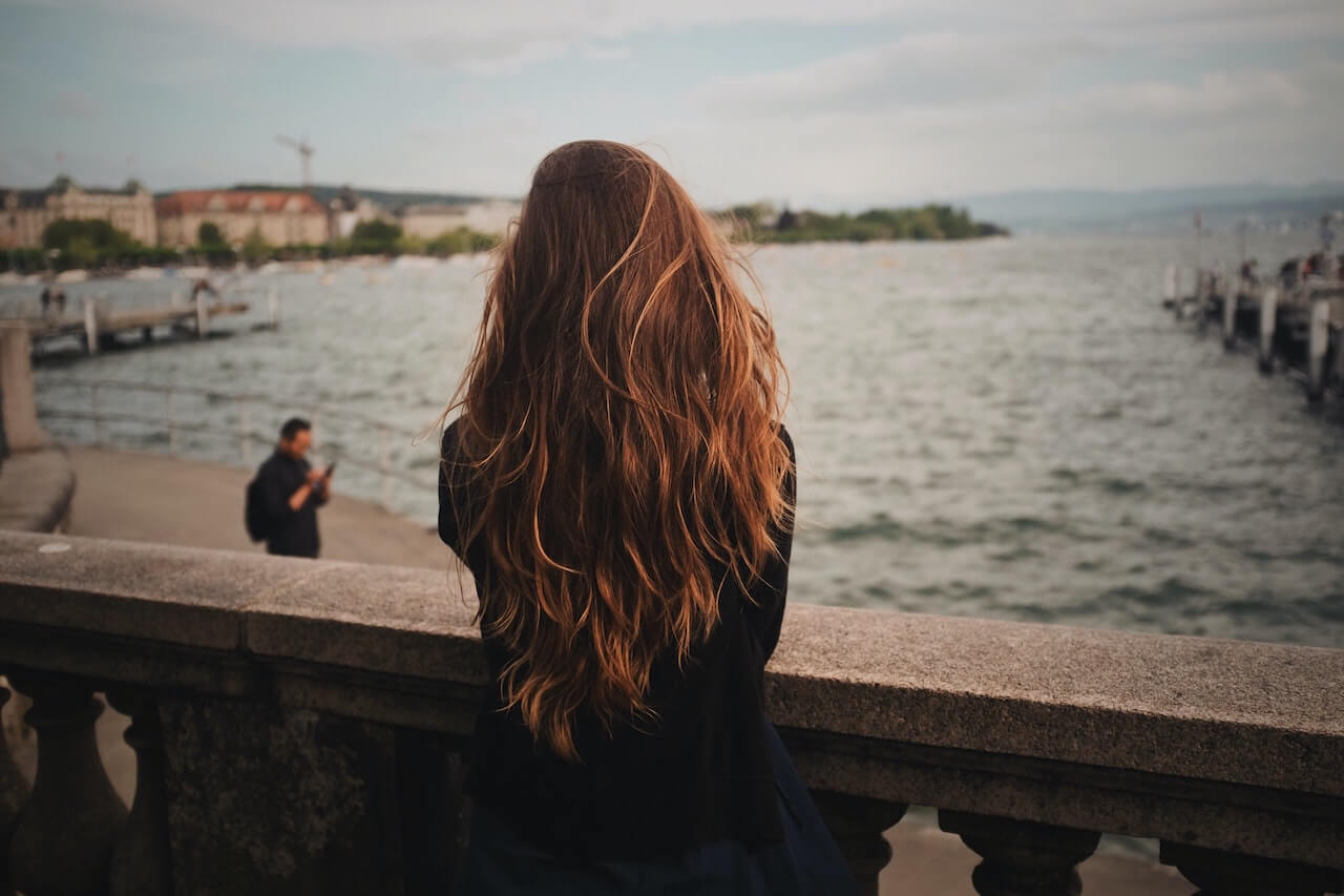 woman overlooking water