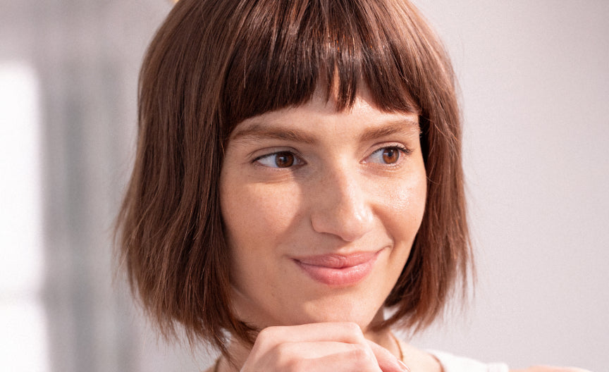 women displays bangs for thin hair