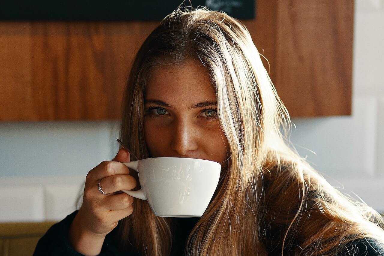 Woman drinking coffee