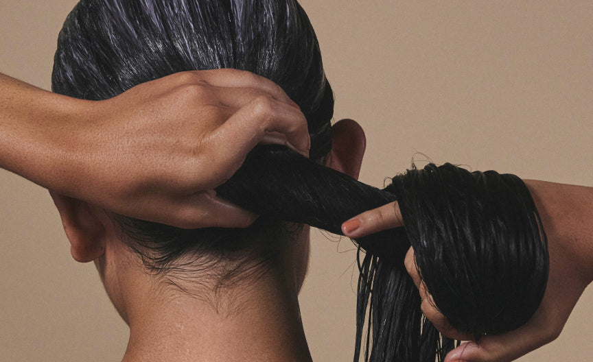 woman applying hair dye, can you dye wet hair safel