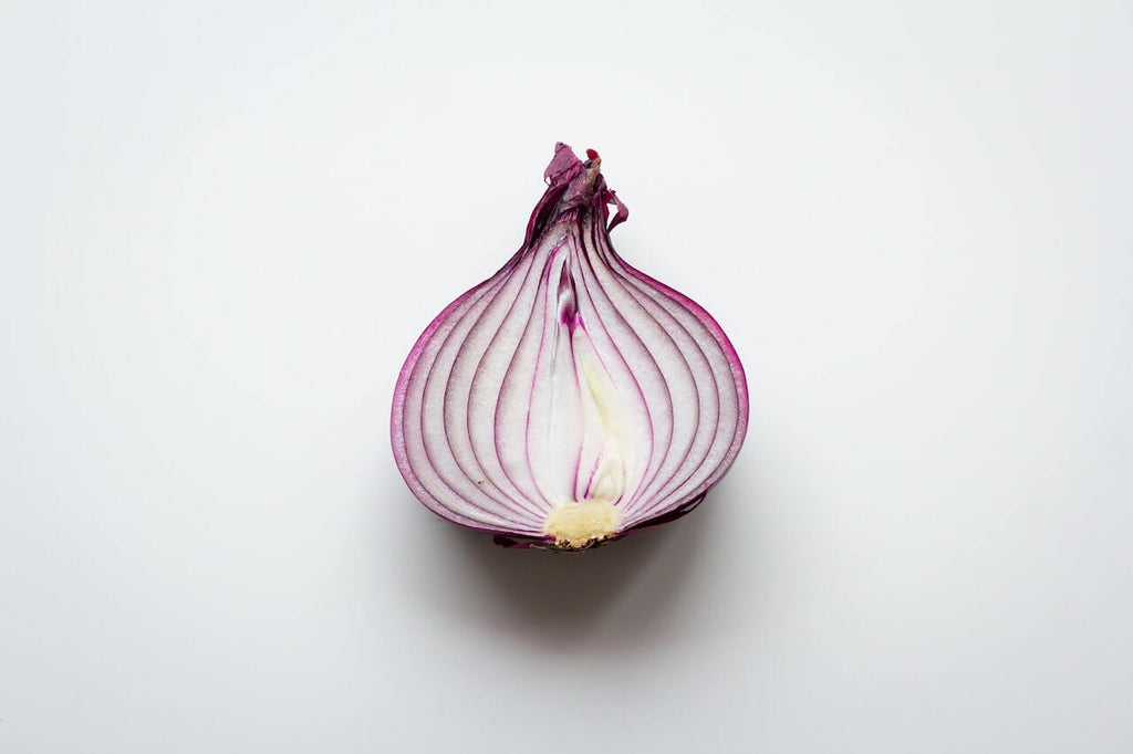 How To Use Onion To Treat Different Hair Problems  Vedix