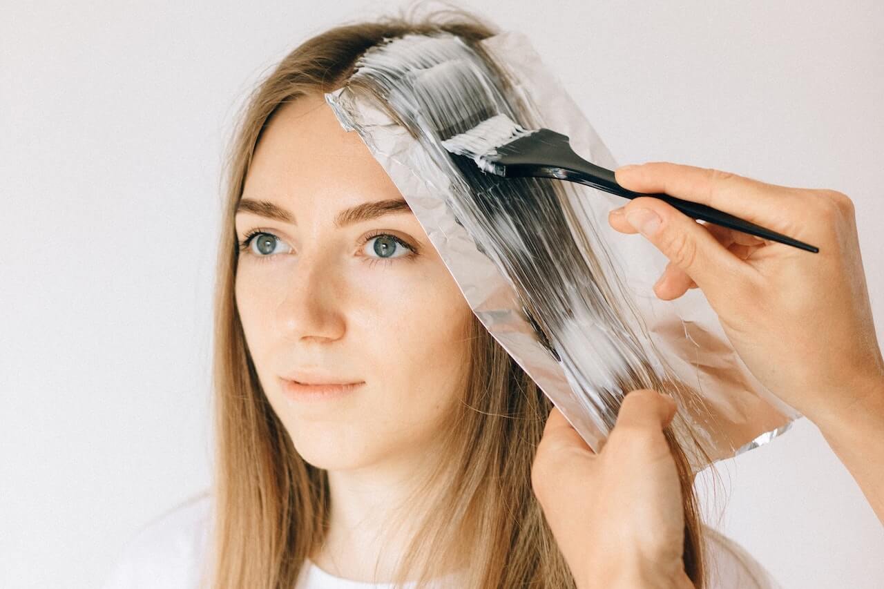 Woman getting her hair colored