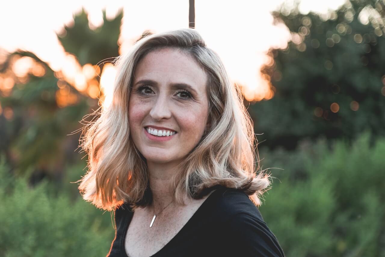 Woman with blonde hair smiling