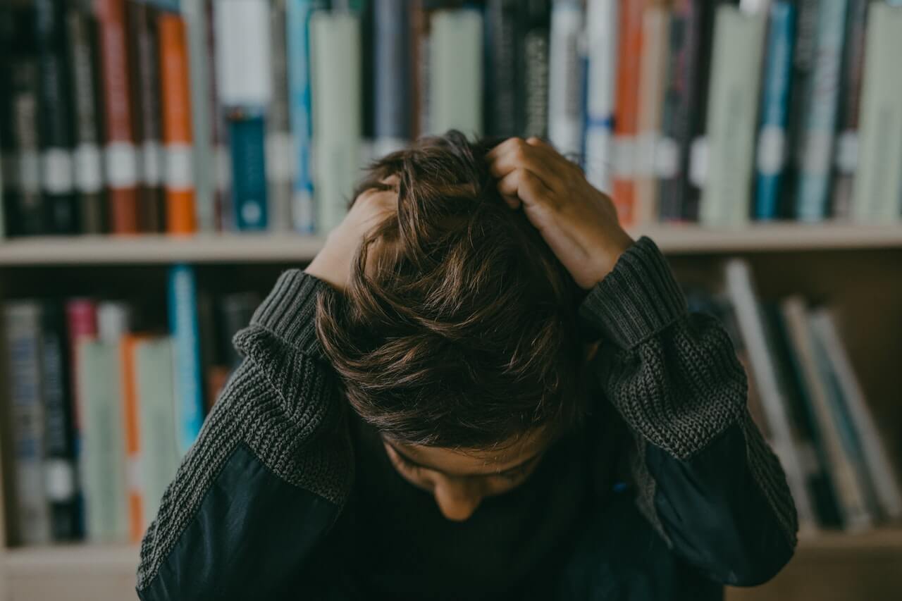 Person pulling their hair