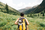 Woman hiking in nature with backpack