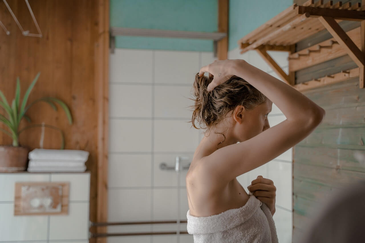 Woman in a towel with wet hair
