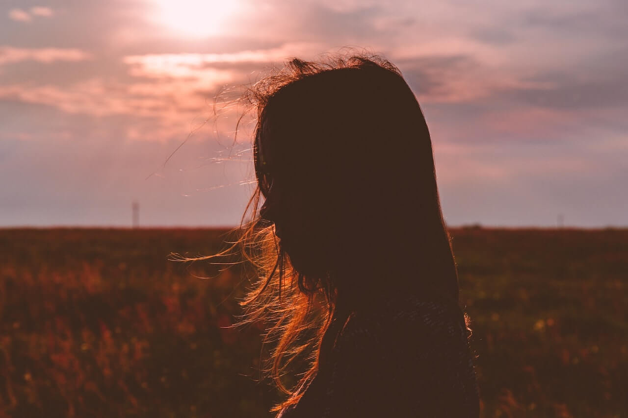 Woman at sunset