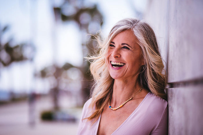 Smiling woman with gray hair