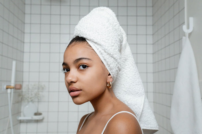Woman wearing a towel on her head