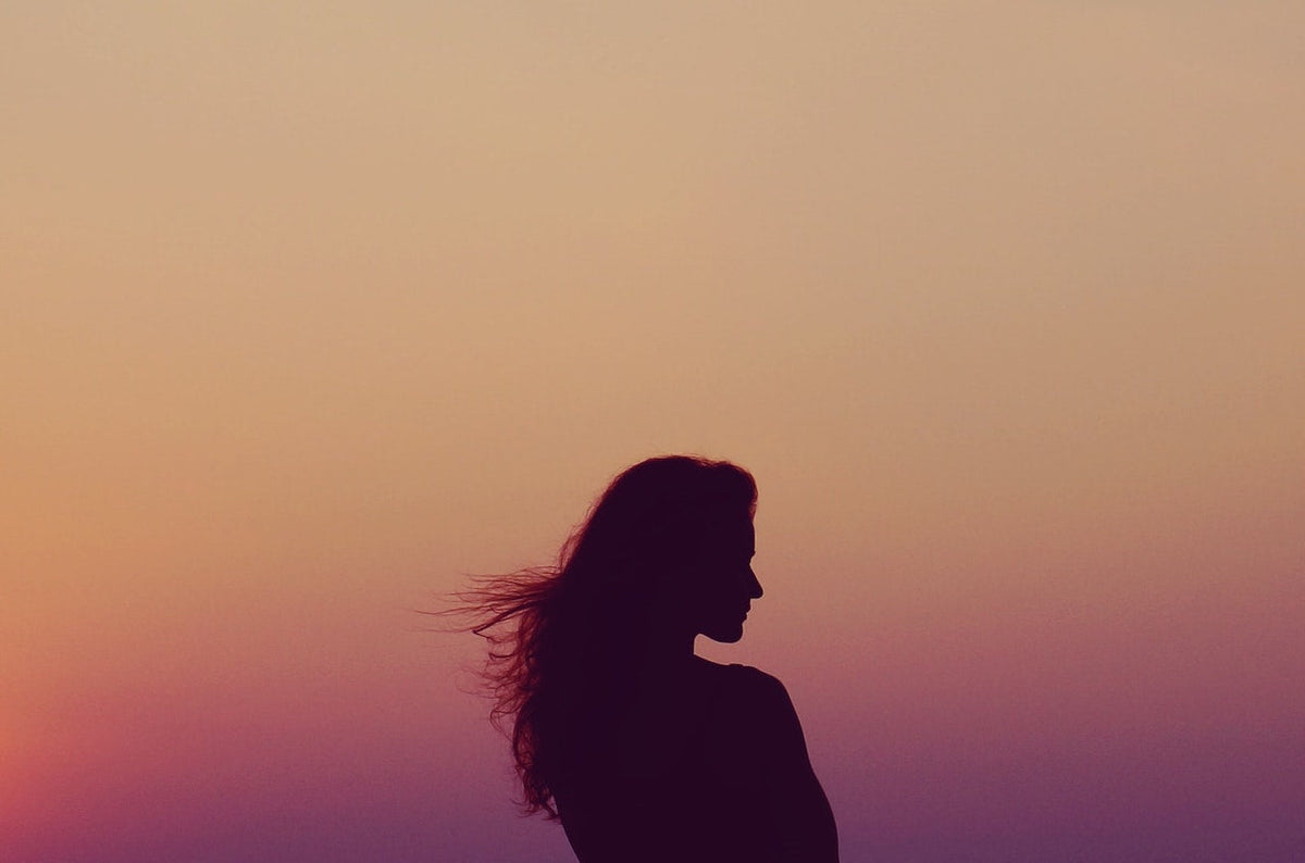 Woman at sunset