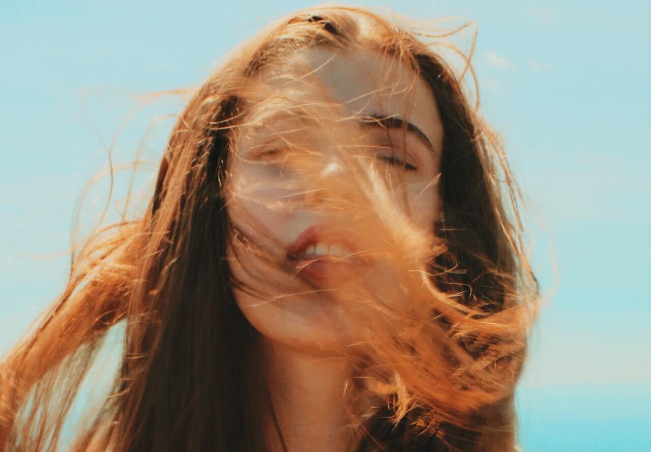 Woman with auburn hair