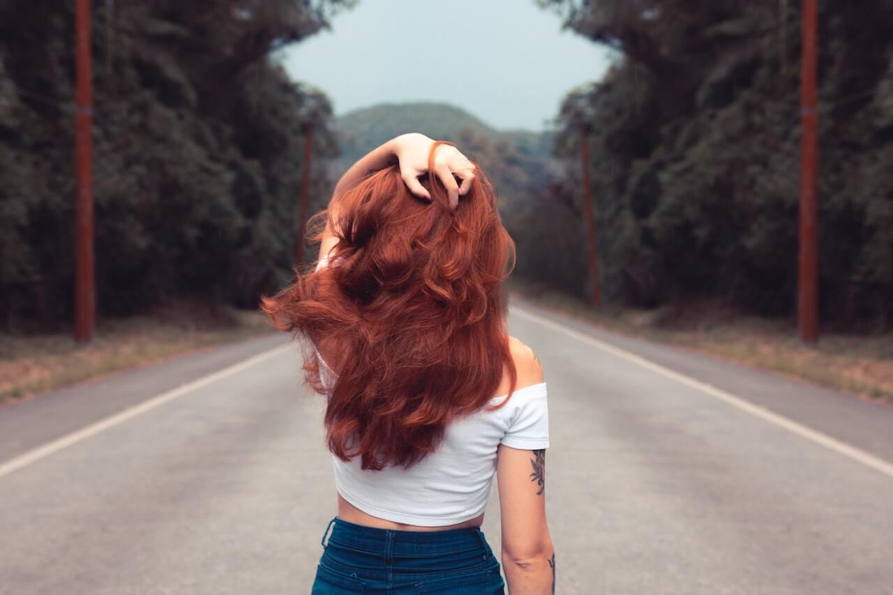 woman touching hair