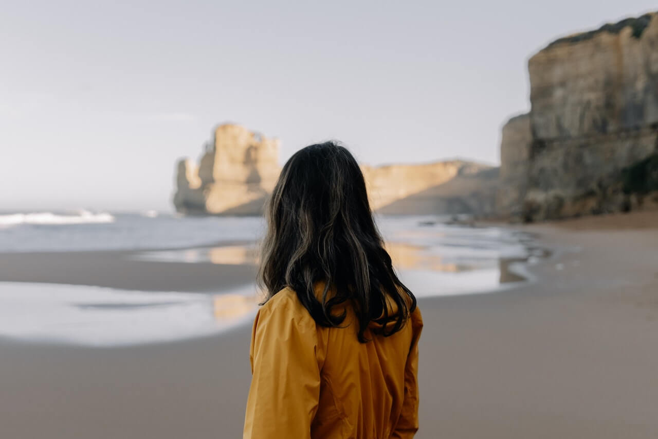 Woman standing on the beach