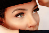 Woman wearing fake eyelashes