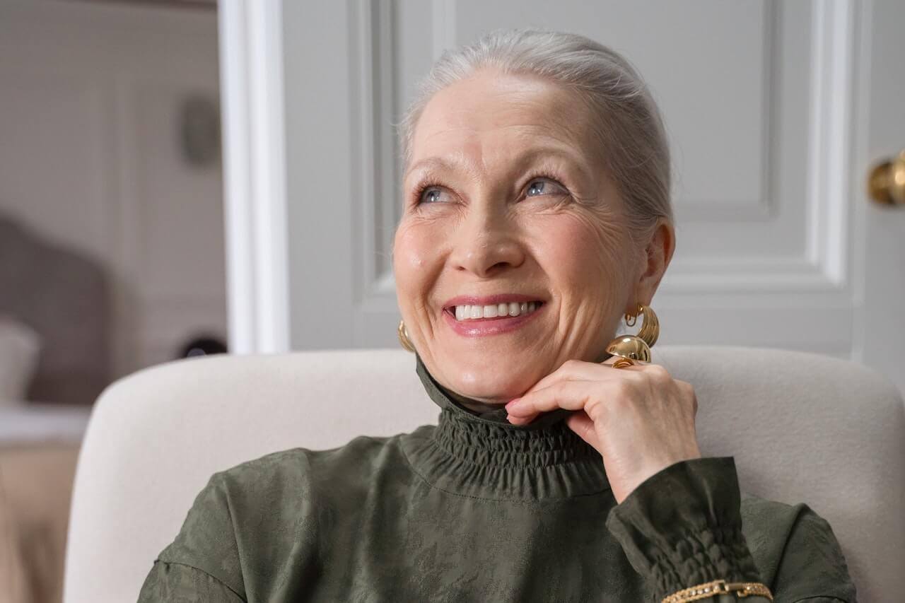Woman with gray hair smiling
