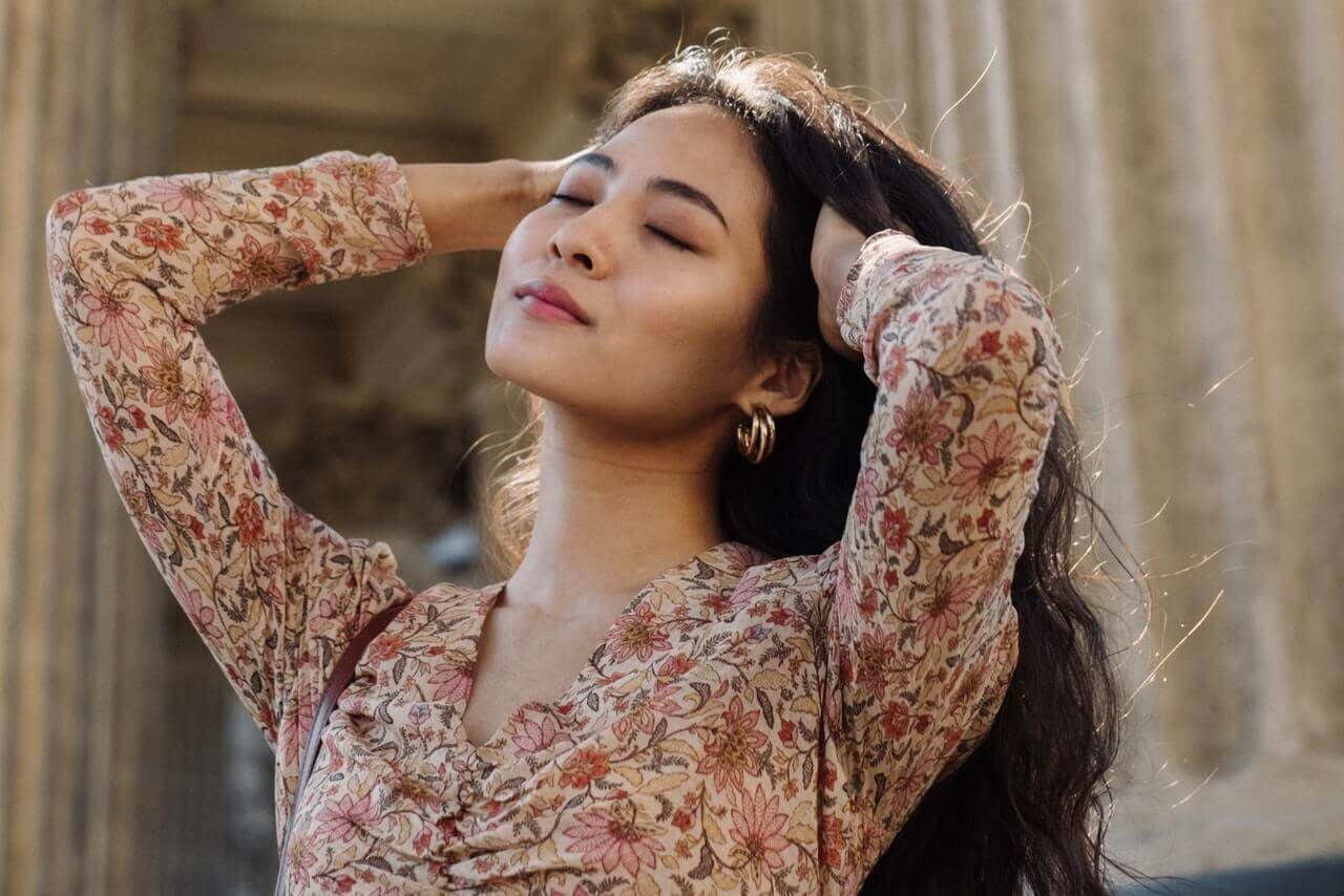 Woman touching her hair