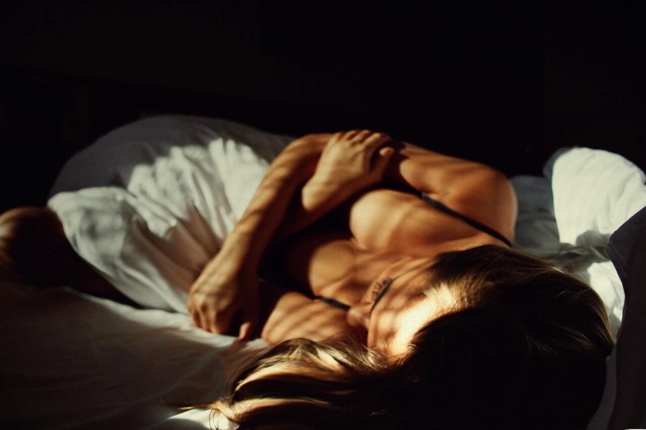 Woman laying in bed